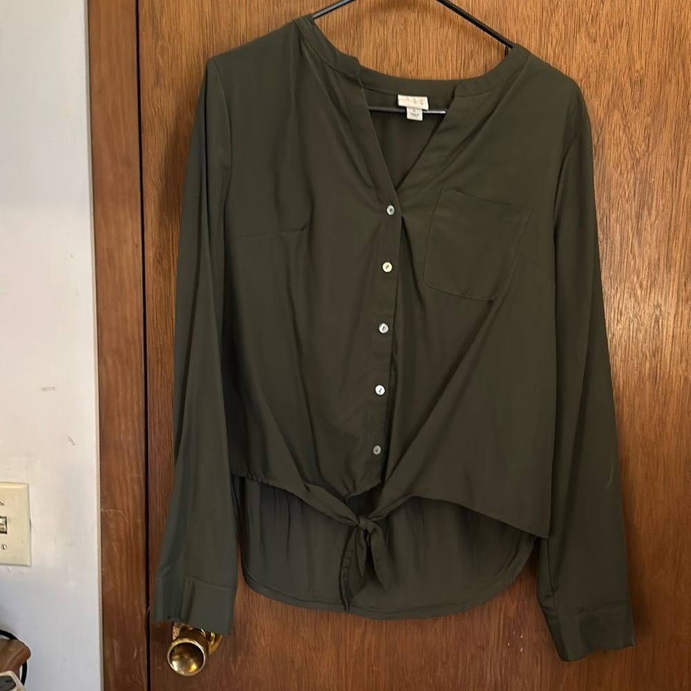Cute, casual blouse.  Lots of detail. Very comfy